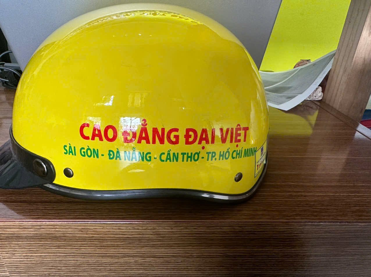 nón bảo hiểm quà tặng in logo cao đẳng  Đại Việt