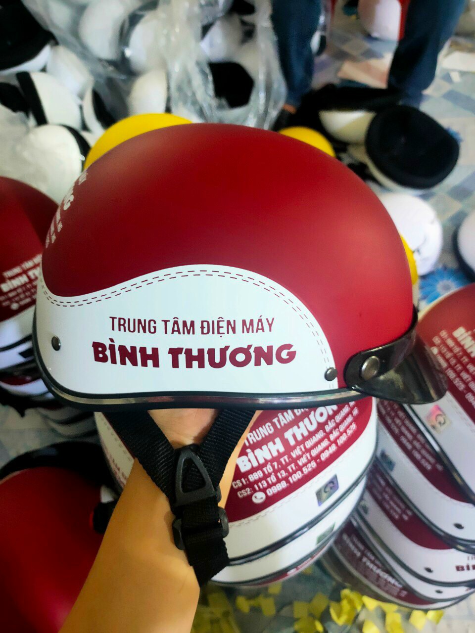 nón bảo hiểm in logo theo yêu cầu trung tâm điện máy Bình Thương